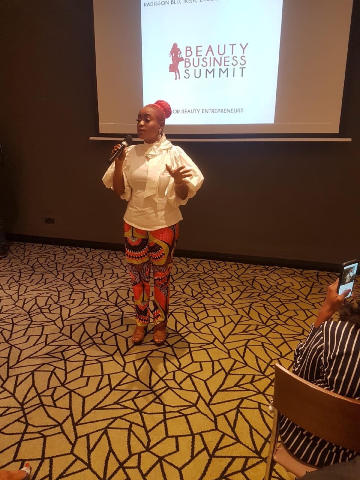 Funke Roberts speaking at the Beauty Business Summit
